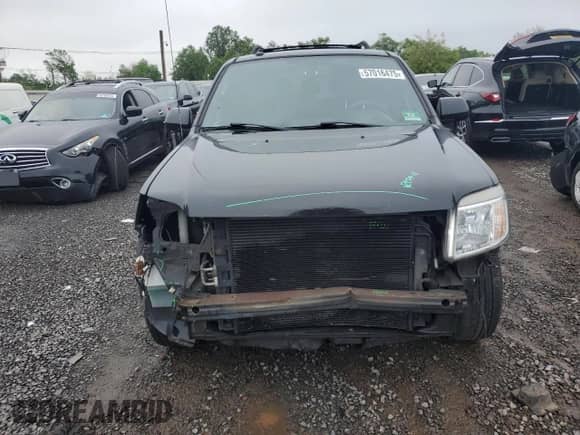 2011 Mercury Mariner Premier with VIN 4M2CN9HG1BKJ00209, listed as a Copart auction lot 57016475 with 224,019 mi miles and Salvage title. Bid and sale history available at DreamBid. Image 5.
