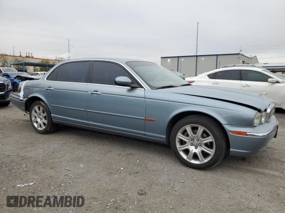 ✅ 2005 Jaguar XJ 8 LWB • VIN: SAJWA79CX5SG35319 • Лот: 49321465. Опубликован ранее на Copart с пробегом 182 834 миль. Бесплатный доступ к архиву аукционных продаж из США и подробный отчёт об истории автомобиля на DreamBid. Изображение 4.