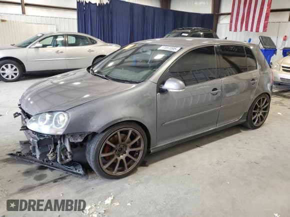 ✅ 2009 Volkswagen Golf GTI • VIN: WVWGD71K99W131014 • Lot: 47857095. Listed on Copart with 180,763 mi. Free auction sales archive from the USA and detailed vehicle history report at DreamBid. Image 1.