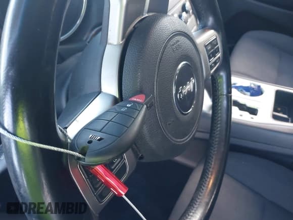 ✅ 2012 Jeep Grand Cherokee Laredo • VIN: 1C4RJFAG7CC184164 • Lot: 43499110. Listed on IAAI with 118,668 mi. Free auction sales archive from the USA and detailed vehicle history report at DreamBid. Image 11.