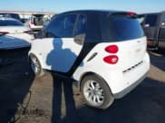 ✅ 2009 Smart fortwo Pure • VIN: WMEEJ31X99K292492 • Lot: 41029051. Listed on IAAI with 57,741 mi. Free auction sales archive from the USA and detailed vehicle history report at DreamBid. Image 3.