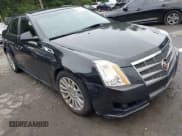 ✅ 2011 Cadillac CTS Performance • VIN: 1G6DL5EY2B0106007 • Lot: 43006512. Listed on IAAI with 146,044 mi. Free auction sales archive from the USA and detailed vehicle history report at DreamBid. Image 1.