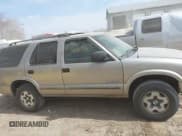 ✅ 2004 Chevrolet Blazer LS • VIN: 1GNDT13X04K164924 • Lot: 41803471. Wystawiony na IAAI z przebiegiem 166 708 mil. Bezpłatny archiwum sprzedaży aukcyjnych z USA i szczegółowy raport historii pojazdu na DreamBid. Zdjęcie 13.