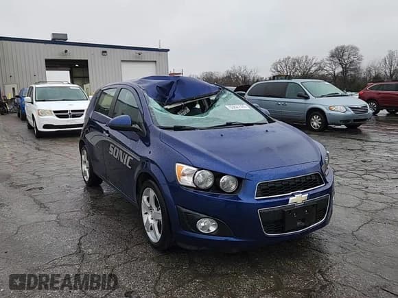 ✅ 2013 Chevrolet Sonic LTZ • VIN: 1G1JE6SB3D4211398 • Lot: 93627505. Listed on Copart with 109,453 mi. Free auction sales archive from the USA and detailed vehicle history report at DreamBid. Image 15.