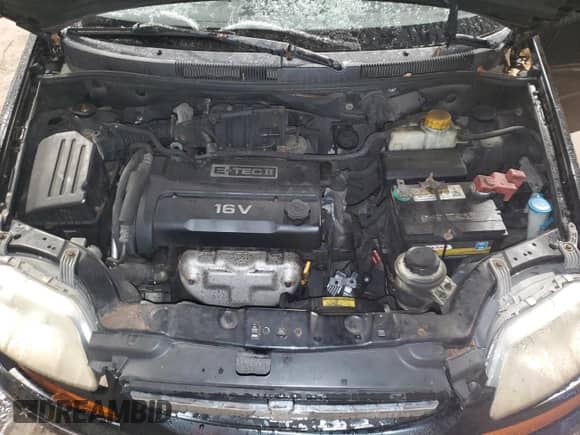 2005 Chevrolet Aveo LS z VIN KL1TD52695B497004, wystawiony jako Copart lot #85917574 z przebiegiem 96 990 mil mil oraz Szkoda całkowita • Salvage title. Historia ofert i sprzedaży dostępna na DreamBid. Obrazek 11.