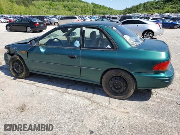 ✅ 1997 Subaru Impreza • VIN: JF1GM4255VH401478 • Lot: 56221515. Listed on Copart with 75,202 mi. Free auction sales archive from the USA and detailed vehicle history report at DreamBid. Image 2.