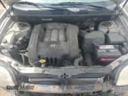 ✅ 2004 Hyundai Santa Fe GLS • VIN: KM8SC13D74U659059 • Lot: 57156945. Listed on Copart with 141,881 mi. Free auction sales archive from the USA and detailed vehicle history report at DreamBid. Image 12.