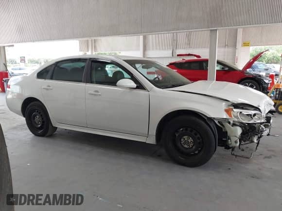 2014 Chevrolet Impala Police Police with VIN 2G1WD5E36E1133932, listed as a IAAI auction lot 42588380 with 174,405 mi miles and . Bid and sale history available at DreamBid. Image 14.