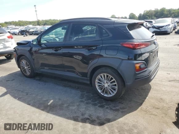 ✅ 2018 Hyundai Kona SEL • VIN: KM8K2CAA2JU101459 • Лот: 69177363. Опубликован ранее на Copart с пробегом 63 570 миль. Бесплатный доступ к архиву аукционных продаж из США и подробный отчёт об истории автомобиля на DreamBid. Изображение 2.