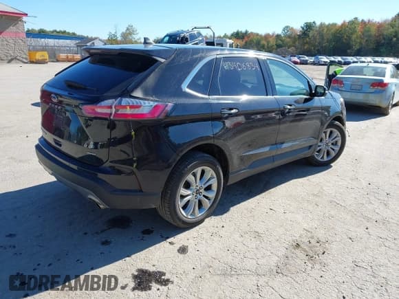 ✅ 2023 Ford Edge Titanium • VIN: 2FMPK4K9XPBA33457 • Lot: 43406834. Listed on IAAI with 49,570 mi. Free auction sales archive from the USA and detailed vehicle history report at DreamBid. Image 4.