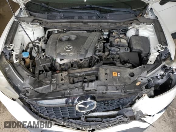 ✅ 2014 Mazda CX-5 Sport • VIN: JM3KE2BE2E0337119 • Lot: 57877765. Listed on Copart with 121,177 mi. Free auction sales archive from the USA and detailed vehicle history report at DreamBid. Image 12.