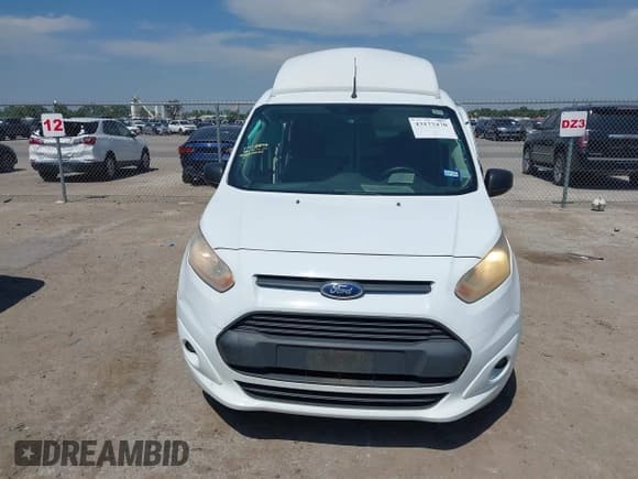 ✅ 2014 Ford Transit Connect XLT • VIN: NM0LS7FX5E1141228 • Lot: 43173470. Listed on IAAI with 125,119 mi. Free auction sales archive from the USA and detailed vehicle history report at DreamBid. Image 12.