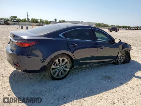 ✅ 2021 Mazda 6 Touring • VIN: JM1GL1VM5M1618471 • Лот: 84789395. Опубликован ранее на Copart с пробегом 31 566 миль. Бесплатный доступ к архиву аукционных продаж из США и подробный отчёт об истории автомобиля на DreamBid. Изображение 3.