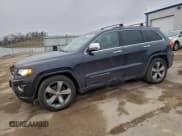 ✅ 2014 Jeep Grand Cherokee Overland • VIN: 1C4RJFCG2EC275066 • Лот: 94445565. Опубликован ранее на Copart с пробегом 164 492 миль. Бесплатный доступ к архиву аукционных продаж из США и подробный отчёт об истории автомобиля на DreamBid. Изображение 1.