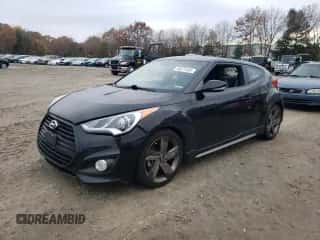 2015 Hyundai Veloster Turbo с VIN KMHTC6AE3FU232834, выставлен на аукционе Copart как лот 76071403 с пробегом 173 259 миль миль и . История ставок и продаж доступна на DreamBid. Изображение 1.