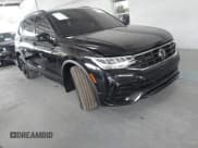 ✅ 2024 Volkswagen Tiguan SE R-Line Black • VIN: 3VVCB7AX4RM106944 • Lot: 42121362. Listed on IAAI with 11,777 mi. Free auction sales archive from the USA and detailed vehicle history report at DreamBid. Image 1.