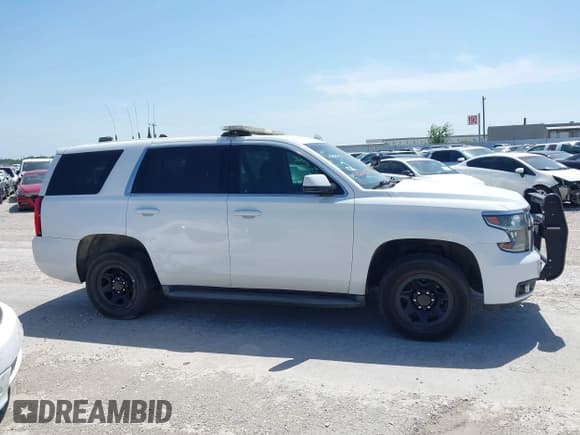 ✅ 2016 Chevrolet Tahoe Commercial • VIN: 1GNLCDEC5GR229480 • Lot: 42666040. Listed on IAAI with 166,104 mi. Free auction sales archive from the USA and detailed vehicle history report at DreamBid. Image 13.