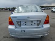 ✅ 2002 Suzuki Aerio S • VIN: JS2RA41S925107118 • Lot: 50070535. Listed on Copart with 128,111 mi. Free auction sales archive from the USA and detailed vehicle history report at DreamBid. Image 6.