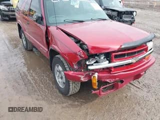 ✅ 2003 Chevrolet Blazer LS • VIN: 1GNCT18X93K171504 • Lot: 41682798. Wystawiony na IAAI z przebiegiem 74 017 mil. Bezpłatny archiwum sprzedaży aukcyjnych z USA i szczegółowy raport historii pojazdu na DreamBid. Zdjęcie 6.