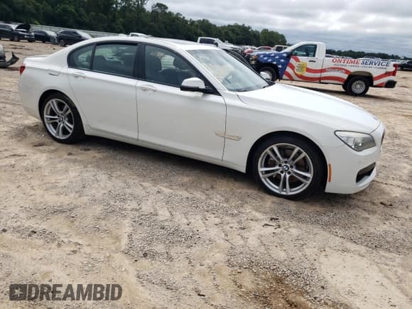 ✅ 2014 BMW 7 Series 740i • VIN: WBAYA6C57ED144572 • Lot: 70323644. Listed on Copart with 88,977 mi. Free auction sales archive from the USA and detailed vehicle history report at DreamBid. Image 4.