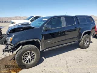✅ 2020 Chevrolet Colorado 4WD ZR2 • VIN: 1GCGTEEN4L1182310 • Лот: 72256164. Опубликован ранее на Copart с пробегом 56 937 миль. Бесплатный доступ к архиву аукционных продаж из США и подробный отчёт об истории автомобиля на DreamBid. Изображение 1.