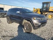 ✅ 2017 Jeep Grand Cherokee Limited • VIN: 1C4RJFBG8HC931647 • Lot: 93243985. Listed on Copart with 144,345 mi. Free auction sales archive from the USA and detailed vehicle history report at DreamBid. Image 4.