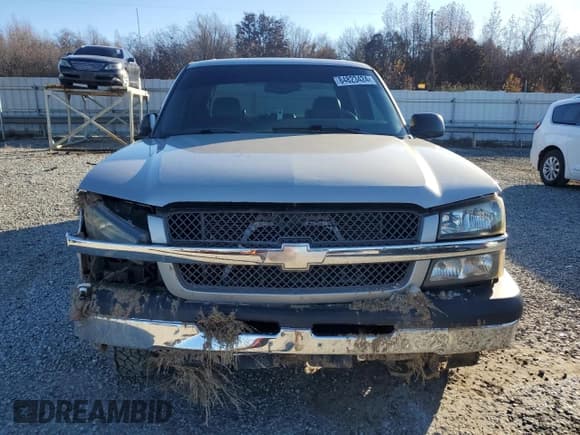 ✅ 2004 Chevrolet Silverado 1500 LS • VIN: 2GCEK13T941382163 • Lot: 84823424. Wystawiony na Copart z przebiegiem 207 003 mil. Bezpłatny archiwum sprzedaży aukcyjnych z USA i szczegółowy raport historii pojazdu na DreamBid. Zdjęcie 5.