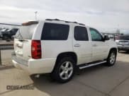 ✅ 2012 Chevrolet Tahoe LTZ • VIN: 1GNSCCE04CR213048 • Lot: 51284685. Listed on Copart with 192,733 mi. Free auction sales archive from the USA and detailed vehicle history report at DreamBid. Image 3.