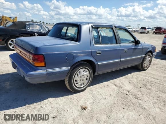 ✅ 1993 Dodge Spirit • VIN: 1B3XA46K0PF638477 • Lot: 75710534. Listed on Copart with 50,637 mi. Free auction sales archive from the USA and detailed vehicle history report at DreamBid. Image 3.