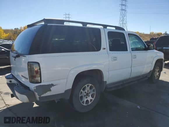 2003 Chevrolet Suburban Z71 с VIN 3GNFK16ZX3G254063, выставлен на аукционе Copart как лот 75757694 с пробегом 202 669 миль миль и Списание • Salvage title. История ставок и продаж доступна на DreamBid. Изображение 3.