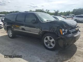 ✅ 2007 Chevrolet Suburban LT • VIN: 1GNFC16J97J299992 • Lot: 62642934. Wystawiony na Copart z przebiegiem 317 375 mil. Bezpłatny archiwum sprzedaży aukcyjnych z USA i szczegółowy raport historii pojazdu na DreamBid. Zdjęcie 4.