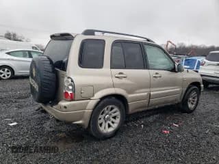 ✅ 2004 Suzuki Grand Vitara LX • VIN: JS3TD62V744102067 • Лот: 50135595. Опубликован ранее на Copart с пробегом Не указан. Бесплатный доступ к архиву аукционных продаж из США и подробный отчёт об истории автомобиля на DreamBid. Изображение 3.