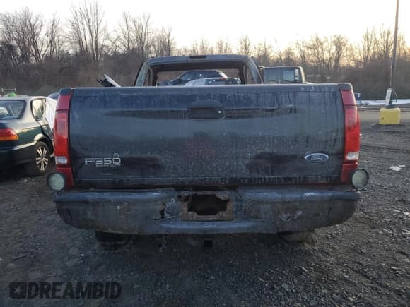 ✅ 2004 Ford F-350 XL • VIN: 1FTSF31L54EA57885 • Lot: 43716415. Listed on Copart with Not provided. Free auction sales archive from the USA and detailed vehicle history report at DreamBid. Image 6.