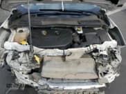 ✅ 2015 Ford Escape Titanium • VIN: 1FMCU0J91FUB72131 • Lot: 91034065. Listed on Copart with 150,247 mi. Free auction sales archive from the USA and detailed vehicle history report at DreamBid. Image 12.