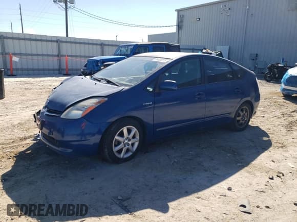 ✅ 2009 Toyota Prius Touring • VIN: JTDKB20U497825657 • Lot: 86538275. Listed on Copart with 143,617 mi. Free auction sales archive from the USA and detailed vehicle history report at DreamBid. Image 1.