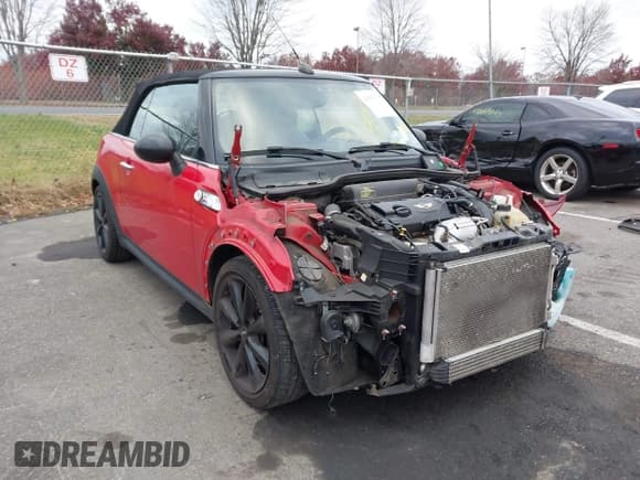 ✅ 2013 MINI Convertible S • VIN: WMWZP3C58DT297757 • Lot: 43656117. Listed on IAAI with 109,314 mi. Free auction sales archive from the USA and detailed vehicle history report at DreamBid. Image 1.