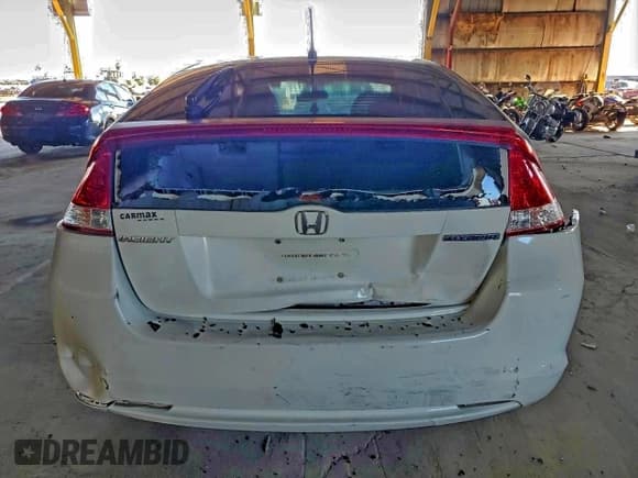 ✅ 2011 Honda Insight EX • VIN: JHMZE2H71BS006191 • Lot: 93865455. Listed on Copart with 240,591 mi. Free auction sales archive from the USA and detailed vehicle history report at DreamBid. Image 6.