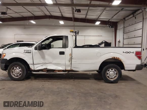 ✅ 2014 Ford F-150 XL • VIN: 1FTMF1EM4EKD69618 • Lot: 43404212. Listed on IAAI with 112,364 mi. Free auction sales archive from the USA and detailed vehicle history report at DreamBid. Image 14.