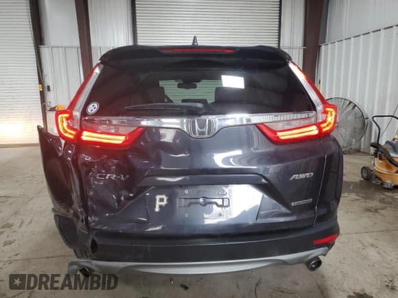 ✅ 2017 Honda CR-V Touring • VIN: 2HKRW2H96HH614845 • Лот: 89653965. Опубликован ранее на Copart с пробегом 119 518 миль. Бесплатный доступ к архиву аукционных продаж из США и подробный отчёт об истории автомобиля на DreamBid. Изображение 6.