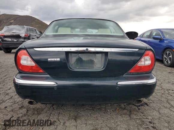 ✅ 2005 Jaguar XJ 8 LWB • VIN: SAJWA79C65SG34572 • Лот: 93790045. Опубликован ранее на Copart с пробегом 148 958 миль. Бесплатный доступ к архиву аукционных продаж из США и подробный отчёт об истории автомобиля на DreamBid. Изображение 6.