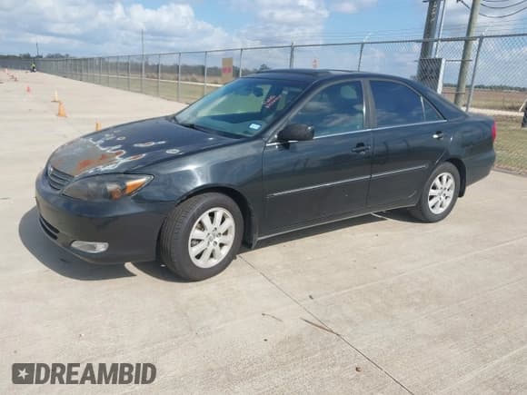 ✅ 2003 Toyota Camry LE • VIN: 4T1BE32K93U257838 • Lot: 43777915. Listed on IAAI with 304,957 mi. Free auction sales archive from the USA and detailed vehicle history report at DreamBid. Image 2.