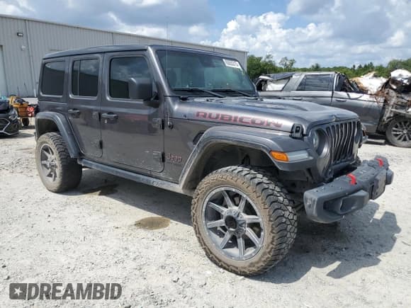 ✅ 2021 Jeep Wrangler Unlimited Rubicon • VIN: 1C4JJXFM8MW701876 • Lot: 65555315. Wystawiony na Copart z przebiegiem 100 411 mil. Bezpłatny archiwum sprzedaży aukcyjnych z USA i szczegółowy raport historii pojazdu na DreamBid. Zdjęcie 4.