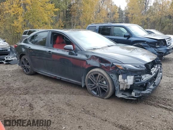 ✅ 2025 Toyota Camry LE • VIN: 4T1DBADK7SU502850 • Lot: 84231305. Listed on Copart with 188,099 mi. Free auction sales archive from the USA and detailed vehicle history report at DreamBid. Image 4.
