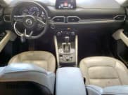 ✅ 2018 Mazda CX-5 Grand Touring • VIN: JM3KFBDM7J0344272 • Лот: 81642645. Опубликован ранее на Copart с пробегом 80 955 миль. Бесплатный доступ к архиву аукционных продаж из США и подробный отчёт об истории автомобиля на DreamBid. Изображение 8.