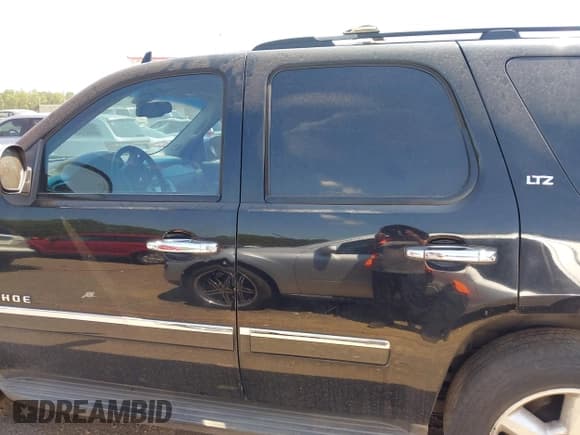 ✅ 2013 Chevrolet Tahoe LTZ • VIN: 1GNSCCE0XDR101839 • Lot: 42849954. Listed on IAAI with 216,647 mi. Free auction sales archive from the USA and detailed vehicle history report at DreamBid. Image 14.