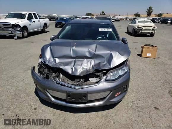 2018 Chevrolet Volt LT z VIN 1G1RC6S57JU151558, wystawiony jako Copart lot #60364363 z przebiegiem Nie podano mil oraz . Historia ofert i sprzedaży dostępna na DreamBid. Obrazek 11.