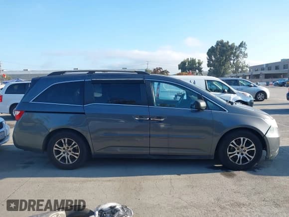 ✅ 2011 Honda Odyssey EX-L • VIN: 5FNRL5H63BB052585 • Lot: 43809942. Listed on IAAI with 224,917 mi. Free auction sales archive from the USA and detailed vehicle history report at DreamBid. Image 14.
