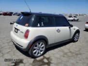 ✅ 2004 MINI Hardtop S • VIN: WMWRE33454TD78702 • Lot: 61276765. Listed on Copart with 192,445 mi. Free auction sales archive from the USA and detailed vehicle history report at DreamBid. Image 3.