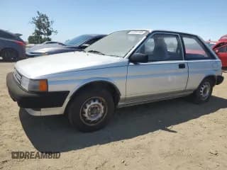 ✅ 1987 Toyota Tercel • VIN: JT2EL31G3H0141207 • Lot: 63304165. Wystawiony na Copart z przebiegiem 133 650 mil. Bezpłatny archiwum sprzedaży aukcyjnych z USA i szczegółowy raport historii pojazdu na DreamBid. Zdjęcie 1.