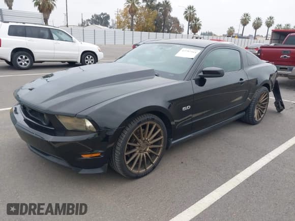 ✅ 2011 Ford Mustang GT Premium • VIN: 1ZVBP8CF0B5106308 • Lot: 43797314. Listed on IAAI with 179,588 mi. Free auction sales archive from the USA and detailed vehicle history report at DreamBid. Image 2.
